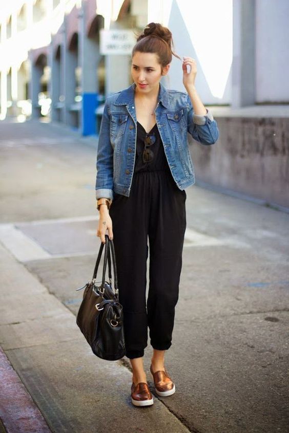 black jumpsuit and denim jacket