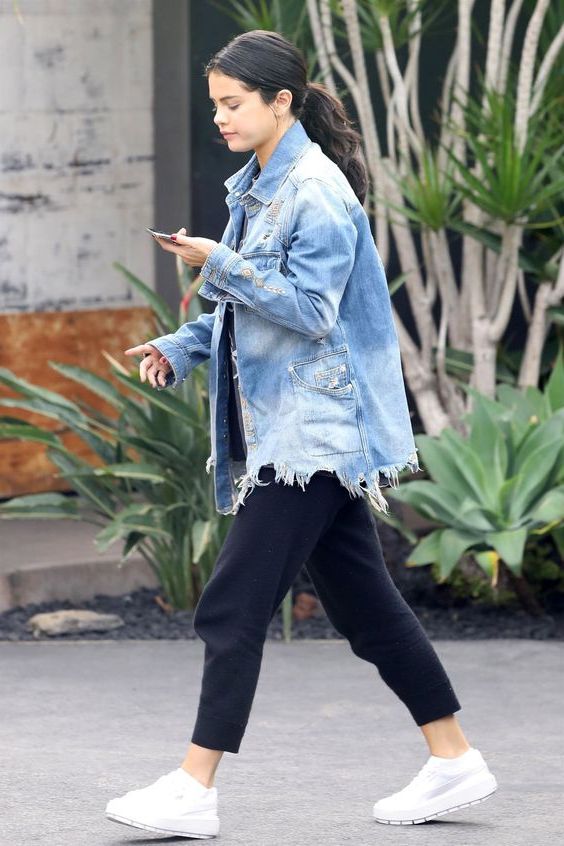 denim jacket with dress and sneakers