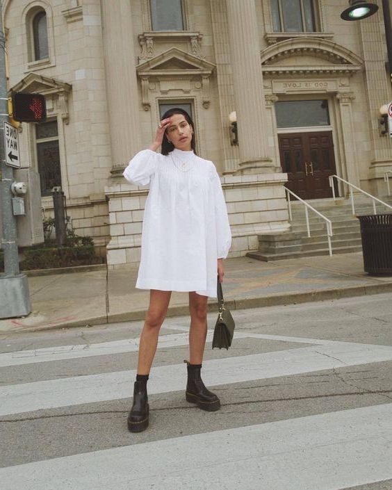 white dress and black boots