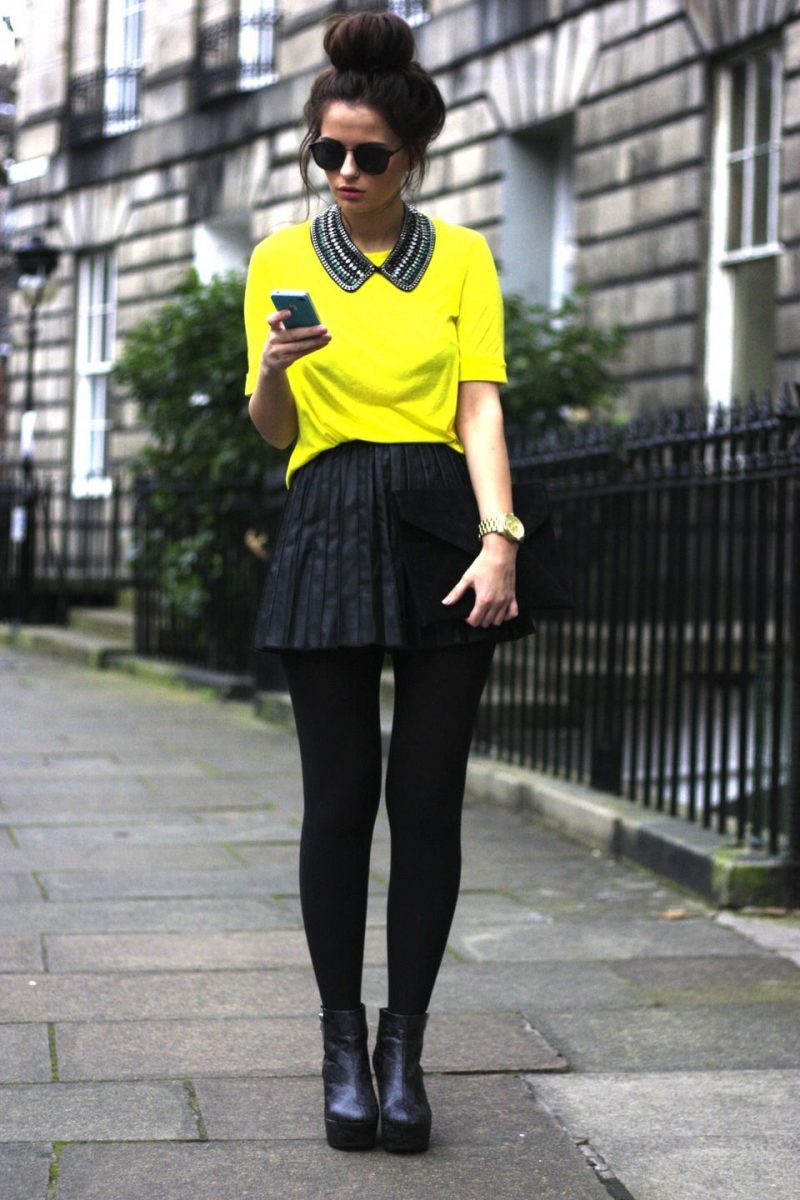 yellow top black skirt